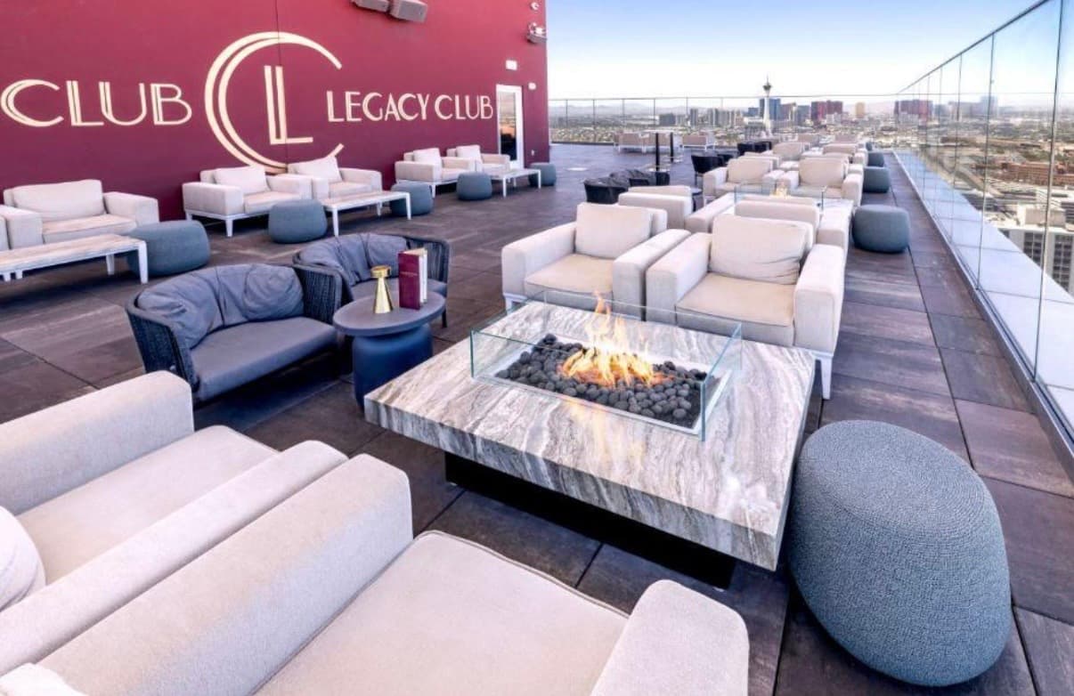 Legacy Club rooftop fire pit with Las Vegas skyline